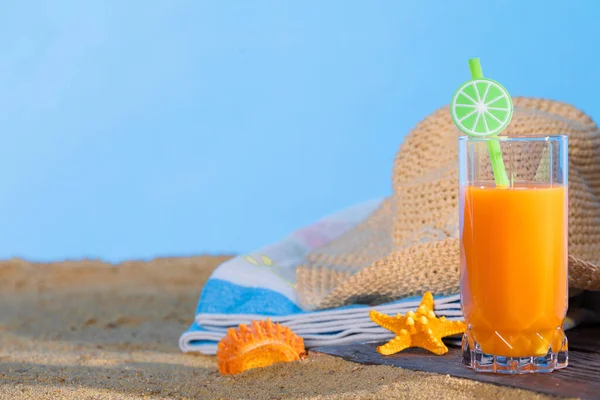 Fresh Orange Fruit Juice Stands Glass Straw Beach Towel Lies — Stock Photo, Image