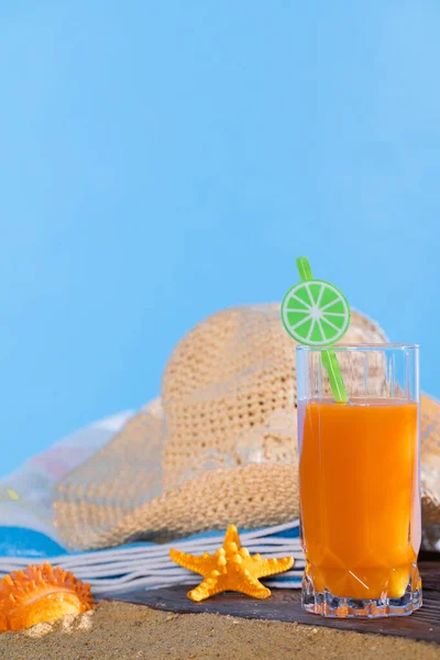 Fresh Orange Fruit Juice Stands Glass Straw Beach Towel Lies — Stock Photo, Image