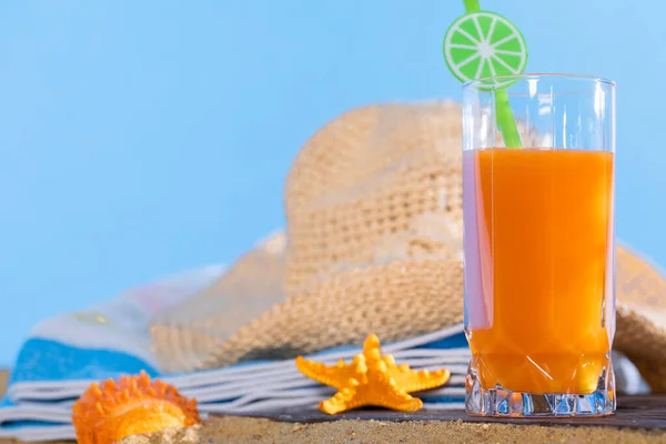 Fresh Orange Fruit Juice Stands Glass Straw Beach Towel Lies — Stock Photo, Image
