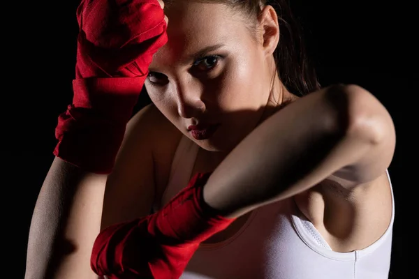 Combination of elbow punches in a sport called MMA for short. Professional player of mixed martial art. Strong woman.