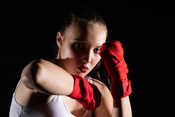 Combination of elbow punches in a sport called MMA for short. Professional player of mixed martial art. Strong woman.