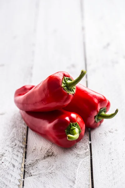 Three Ripe Red Peppers Paprika Wooden Board — Stock Photo, Image