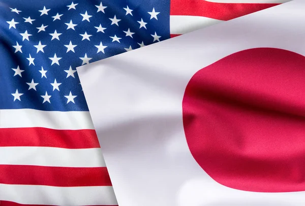 Flags of United states of america and japan flag together.