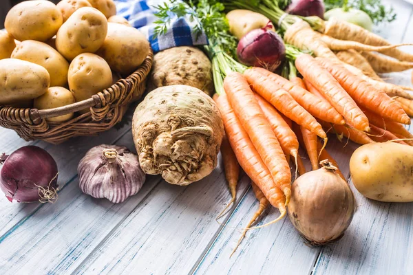 Assortment Fresh Vegetables Wooden Table Carrot Parsnip Garlic Celery Onion — Stock Photo, Image