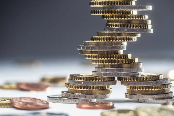 Euro coins stacked on each other in different positions. Close-up european money and currency — Stock Photo, Image