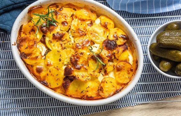 Roasted potatoes in baking dish traditional easten european food titled as france potato — Stock Photo, Image