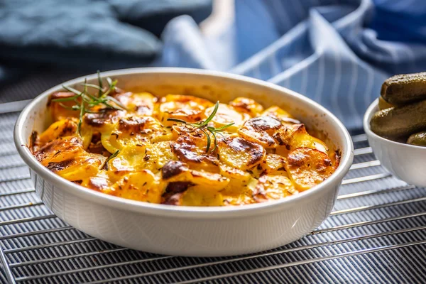 Roasted potatoes in baking dish traditional easten european food titled as france potato — Stock Photo, Image