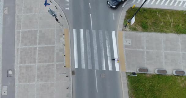 A Man Crossing The Crosswalk. Cars Waiting Until Man End Cross The Street — Stock Video