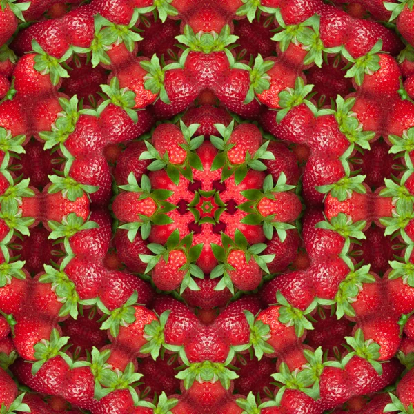 Red fruit background.  Fresh ripe red strawberry with green leaves, close-up, full frame, macro