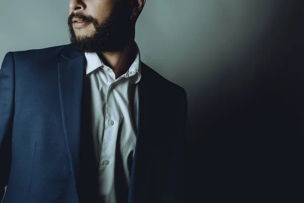 Beard man in a blue suit