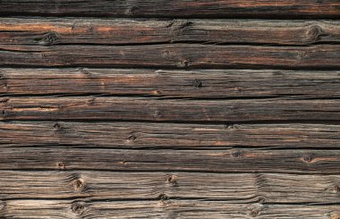 Eski kaba günlüklerin dokusu. Düğümlü odunsu yüzey.