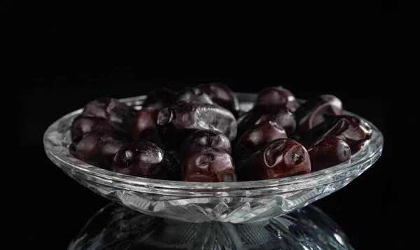 Crystal Saucer Bunch Dried Dates Dark Mirror Background — Stock Photo, Image