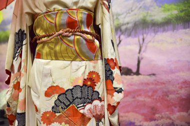 Kimono. Traditional Japanese dress for women with colorful decorations clipart