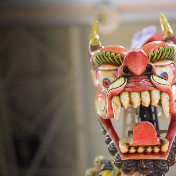 Traditional red dragon mask of Asian peoples