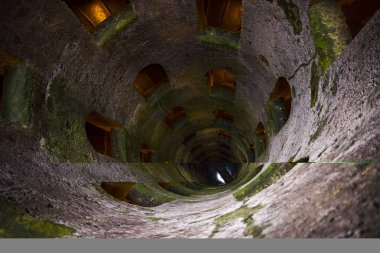 St. Patrick's well, Orvieto, Italy. Historic well. Great engineering work, built in 1547. depth 54 meters, width 13 meters .. characteristics are the spiral stairs clipart