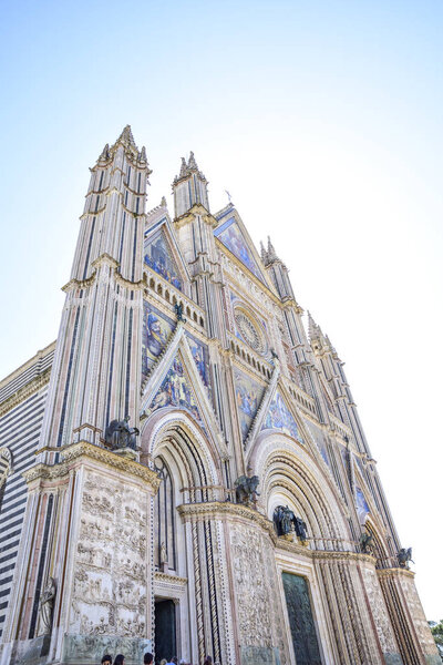 Facade of the Cathedral of Orvieto (Duomo di Orvieto) Italy. Construction in Gothic style dedicated to the Madonna