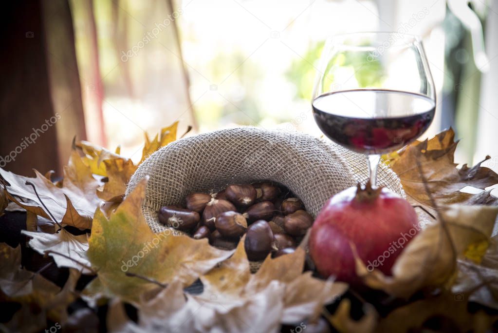 chestnuts with glass of wine