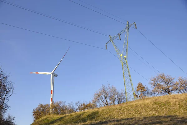 Eco energy. Wind turbine for the production of renewable energy. Trentino, Italy