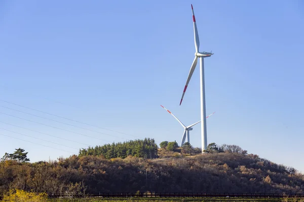 Eco energy. Wind turbines for the production of renewable energy. Trentino, Italy