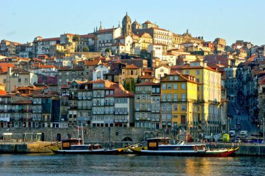 Douro river and traditional boats in Oporto, Portugal clipart