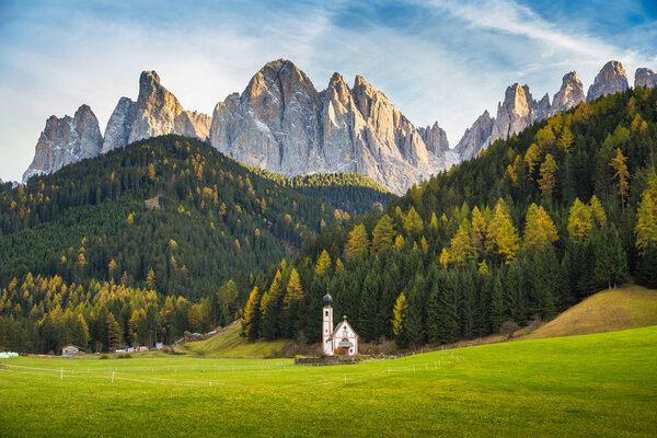 Church of St. Johann of Nepomuk with Odle Group in the Dolomites, South Tyrol, Italy