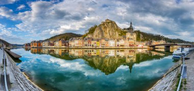 Historic town of Dinant with river Meuse at sunset, Wallonia, Belgium clipart