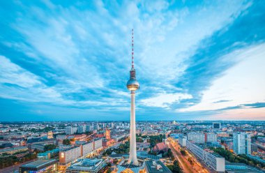 Berlin skyline panorama with famous TV tower at Alexanderplatz at twilight clipart