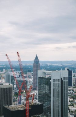 aerial view of crane, skyscrapers and buildings in Frankfurt, Germany  clipart