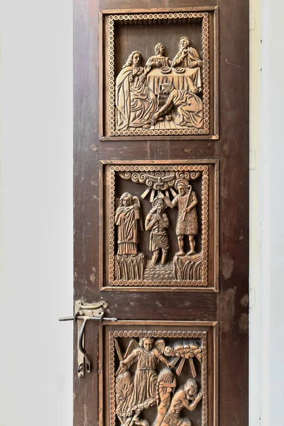 Carved Wooden Door Panel Depicting Biblical Episodes Feet Washing Baptism — Stock Photo, Image