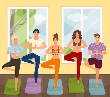 Bir grup genç insan pratik yoga dersi ayakta Vrksasana egzersiz, ağaç poz
