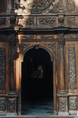 ancient wooden building gate at Wroclaw, Poland clipart