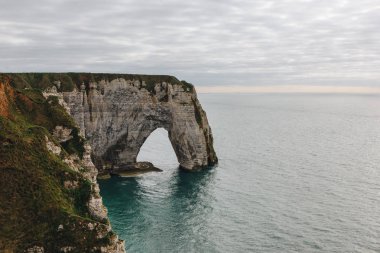 aerial view of rocky cliff and sea, Etretat, Normandy, France clipart