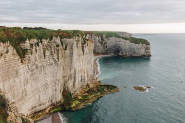 beautiful landscape with cliff at seaside, Etretat, Normandy, France clipart