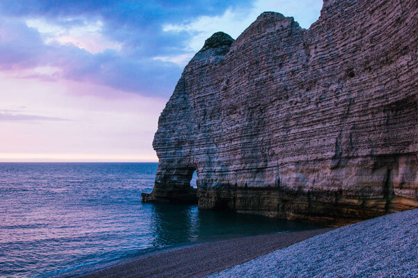 calm evening at the sea near cliff, Etretat, Normandy, France