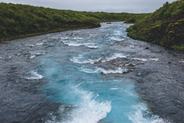 aerial view of Bruara river flowing through highlands in Iceland clipart