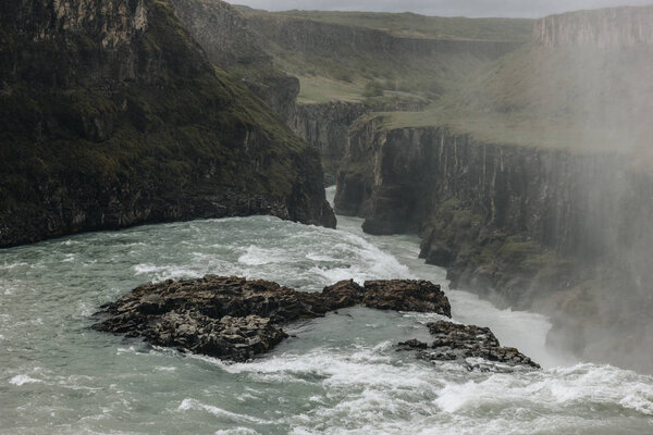 high angle view of steam above Gullfoss waterfall in Iceland