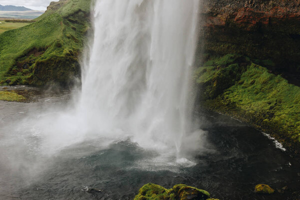 close up view of Seljalandsfoss waterfall in highlands in Iceland 