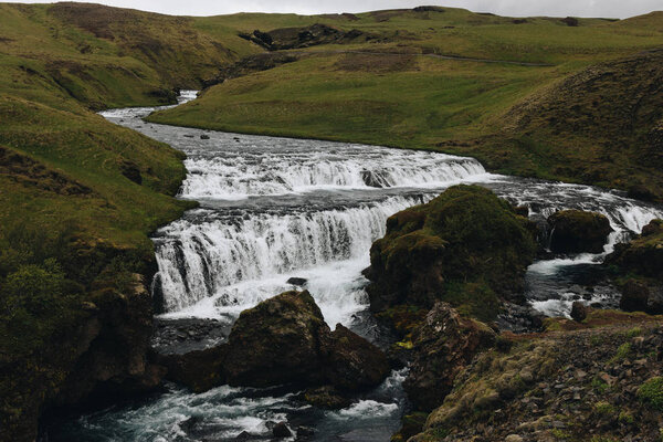 scenic view of beautiful Skoga river flowing through highlands in Iceland