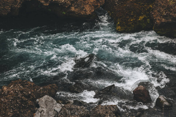 high angle view of beautiful mountain river flowing through highlands in Iceland
