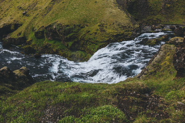 aerial view of beautiful Skoga river flowing through highlands in Iceland