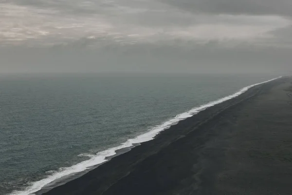 Zwarte zand — Stockfoto