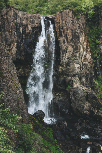 aerial view of beautiful waterfall in Skaftafell National Park in Iceland