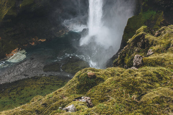 aerial view of Haifoss waterfall with green cliff on foreground, Iceland