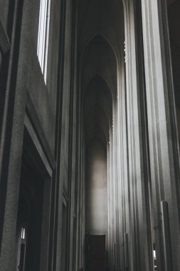  REYKJAVIK, ICELAND - 22 JUNE 2018: interior of beautiful Hallgrimskirkja church with many pillars in Reykjavik clipart