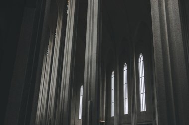  REYKJAVIK, ICELAND - 22 JUNE 2018: interior of Hallgrimskirkja church with many columns in Reykjavik clipart