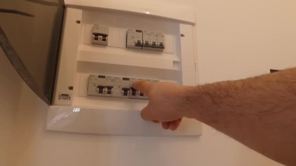 Circuit Breaker Board Displays Many Switches Finger Turn Back — Stock Video