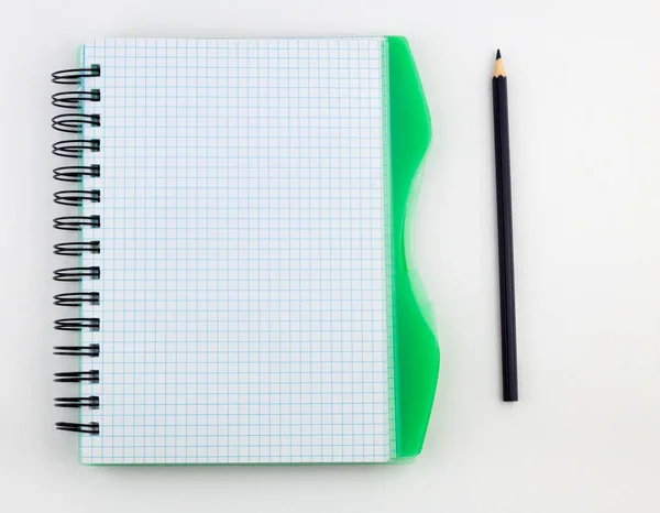 blank laptop with pencil pen on white desk, business concept.