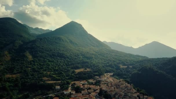 Aerial view, city and rocky walls and valleys in the mountains of Abruzzo Italy — Stock Video