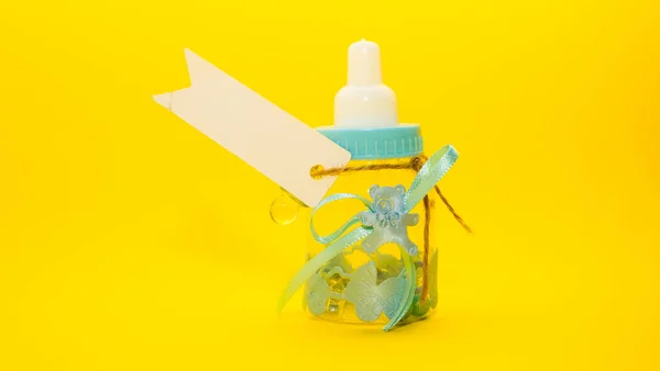 Gift Form Baby Bottle Yellow Background — Stock Photo, Image