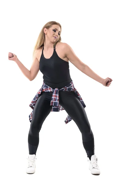 stock image Blonde attractive woman dancing jazz dance aerobics passionately with closed eyes. Full body length portrait isolated on white background.